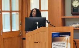 Amiyah Davis stands at the podium.