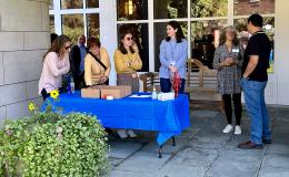 SSRI staff greeting attendees.