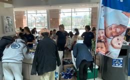 Group of students participating in the event inside the HUB-Robeson Center.