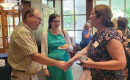 Attendees of the annual SSRI Spring Celebration gather in the Hintz Alumni Center.
