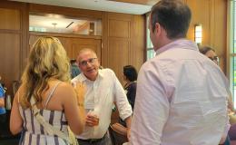 Attendees of the annual SSRI Spring Celebration gather in the Hintz Alumni Center.