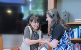 Deborah Ehrenthal, SSRI Director, and Lisa Ryan, Data Compliance Specialist for PRI, with her Diversity and Inclusion Award.
