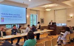Cheryl Thompson, SSRI associate director, introduces the first research flash talk speaker, Koraly Pérez-Edgar, SSRI associate director.