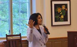Penn State President Bendapudi talks to the group.