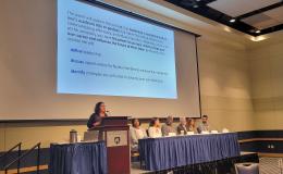 Zoubeida Ounaies holds a panel discussion with researchers.