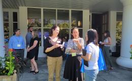 Attendees gathered outside Alumni Hall. 