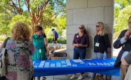 SSRI admin team welcomes attendees.
