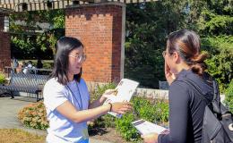 Attendees of the SSRI Fall Welcome event mingling.
