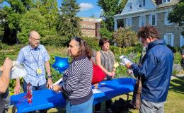 Attendees of the SSRI Fall Welcome event mingling.
