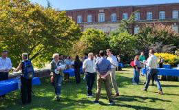 Attendees of the SSRI Fall Welcome event mingling.