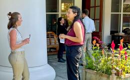 Attendees mingling at on the Alumni Hall lawn.