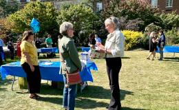 Attendees mingling at on the Alumni Hall lawn.