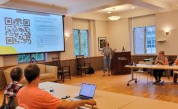 Project Manager for the SRC, Valerie Keppenne, presents to the group.