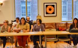 Attendees listening to the presentation.