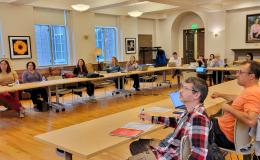 Attendees listening to the presentation.