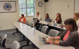 Attendees listening to Courtney Karmelita's presentation.