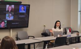 Courtney Karmelita talks to the group about research integrity.