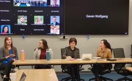 Four women, Jessica Thompson, Kathyrn Risher, Corina Graif, and Thoa Khuu, sit at a table to discuss NIH K awards.