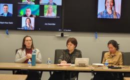 Four women, Jessica Thompson, Kathyrn Risher, Corina Graif, and Thoa Khuu, sit at a table to discuss NIH K awards.