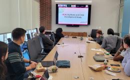 SSRI Open House attendees congregate in Room 314 to hear about the HBCD data release.
