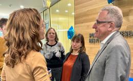 SSRI Director, Deb Ehrenthal, chats with SSRI Open House attendees.