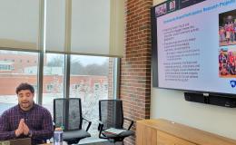 Mark Ortiz, SSRI cofunded faculty member, presents to the group.