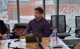 Mark Ortiz, SSRI cofunded faculty member, presents to the group.