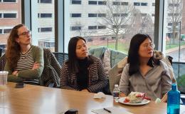 Attendees of the SSRI Open House listen to Kyle Aun's presentation.