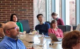 Attendees of the ICDS Open House listen to the presentation in 314 Welch.