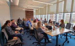 Wide shot of the attendees of the ICDS Open House.