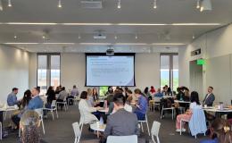 Wide shot of attendees listening to Brad Linn's talk.