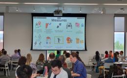 Wide shot of the atteendes listening to Rachel Marcus's talk.