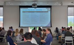 A wide shot of the PowerPoint presentation from Dan Mallinson's talk.