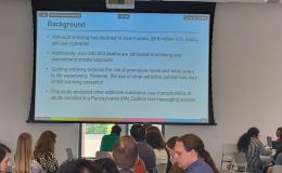 A wide shot of the PowerPoint presentation from Sophia Allen's talk.