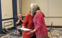 SSRI Director Deborah Ehrenthal poses with Workplace Climate winner, Senior Administrative Support at the Child Maltreatment Solutions Network.