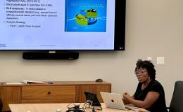 Cleothia Frazier, SSRI co-funded faculty member and assistant professor of sociology and demography, presents to the group.