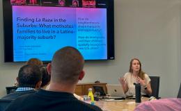 Julia Szabo, assistant professor of sociology and Latino studies, presenting about her research to the group.