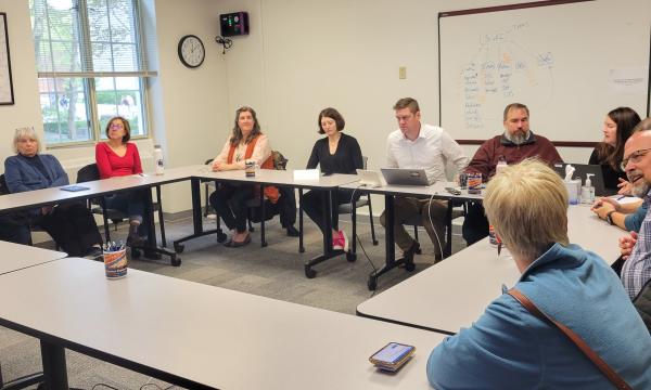 Attendees listen to a presentation about SSRI's Data Resources Hub. 