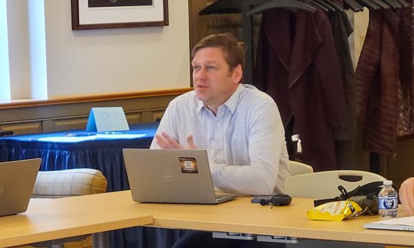 Jason Shumberger presents to the group about using restricted data.