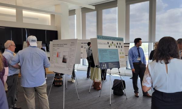 CSUA conference attendees enjoy the Poster Session.