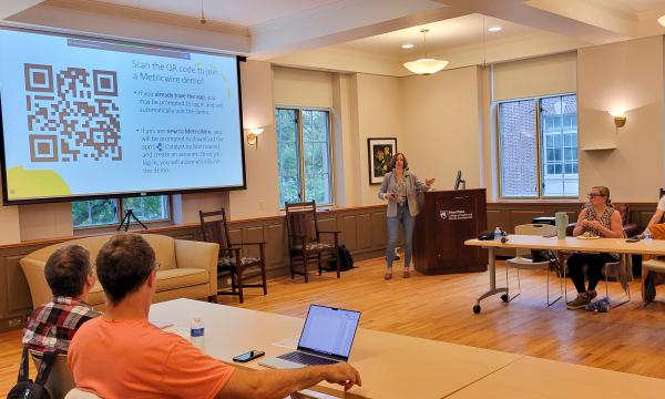 Project Manager for the SRC, Valerie Keppenne, presents to the group.