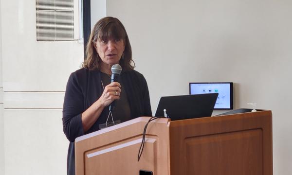 Deborah Ehrental, SSRI director, welcomes the group to the annual CSUA conference.