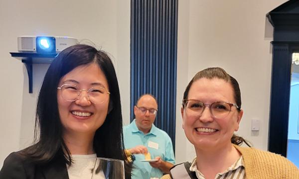 SSRI co-funds Jessica Thompson and Xue Zhang pose for a photo.
