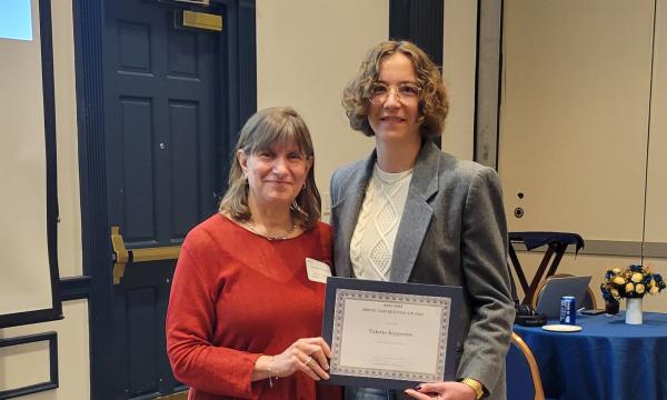 SSRI Director Deborah Ehrenthal poses with Above and Beyond Award winner, Valerie Keppenne, Research Project Manager at the Survey Research Center.