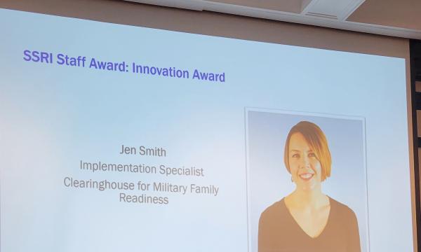 Barbara Rigg announces the winner of the Innovation Award, Jen Smith, Implementation Scientist at the Clearinghouse for Military Family Readiness.